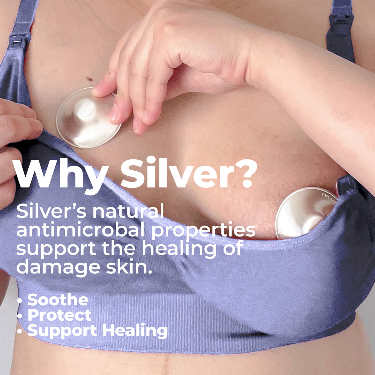 A close-up of a person wearing a lavender-blue bra with two round metallic silver breastfeeding and nursing cups applied to the chest. Large white text reads 'Why Silver?' with supporting text about antimicrobial properties and healing skin.